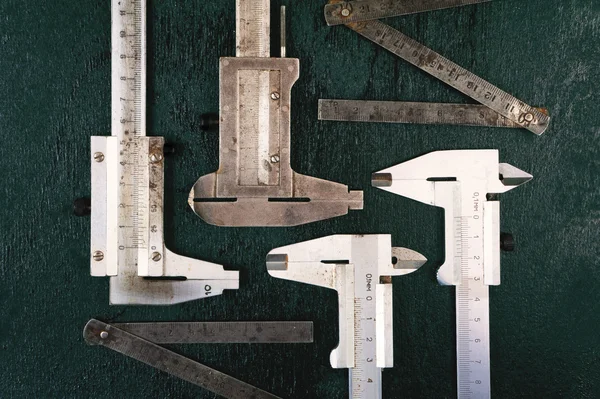 Measuring instruments. Caliper and iron ruler
