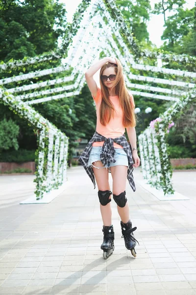 Redhead girl on the rollers