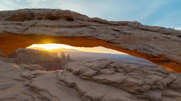Panorama of sunrise at Mesa Arch in Canyon lands National Park, USA