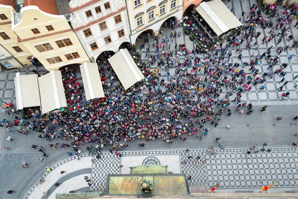 Top view of tourist crowd in old town square in Prague