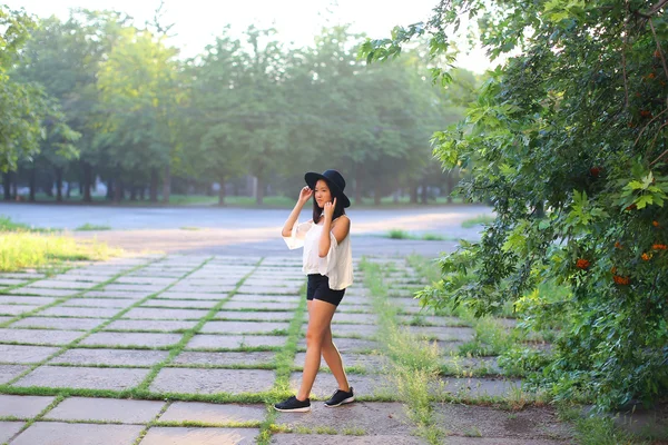 Wonderful female hat asian sunset cheerful emotions laughter dancing