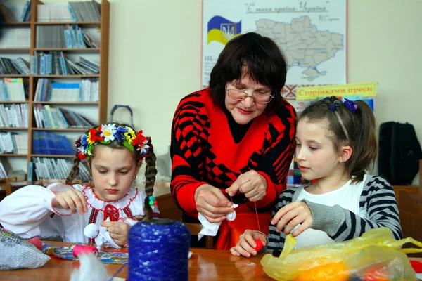 Women learn to make handmade soft toys and souvenirs