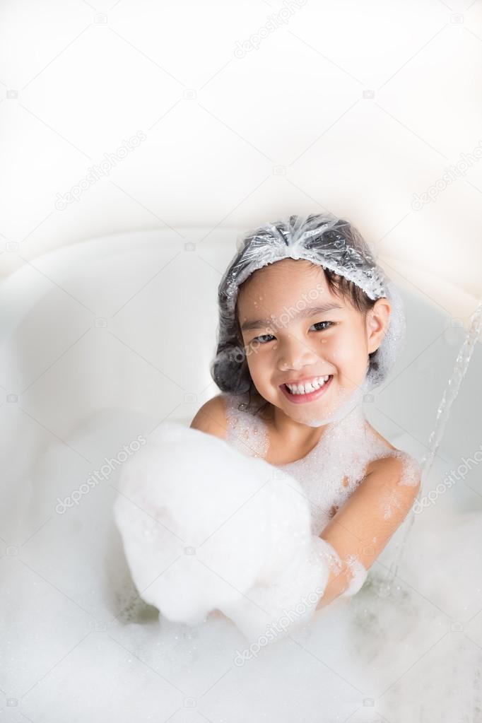 Little Girl Having Fun In A Bathtub Full Of Soap Foam Stock Little Girl Having Fun In A Bathtub Full Of Soap Foam Stock Photo 116400986