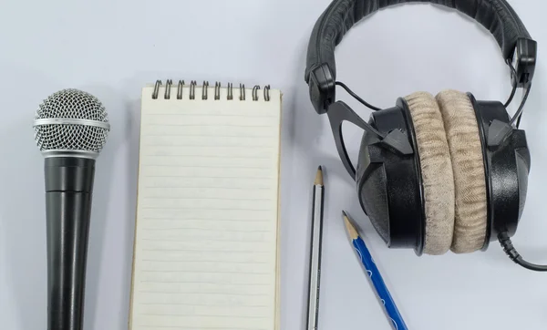 Blank notebook in top view with music concept
