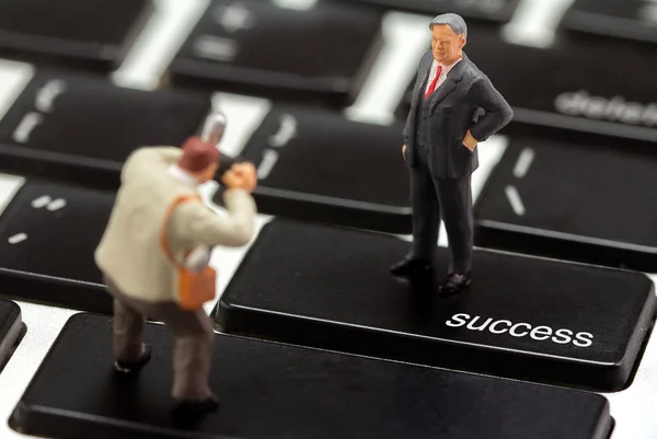 Miniature figurines of successful business