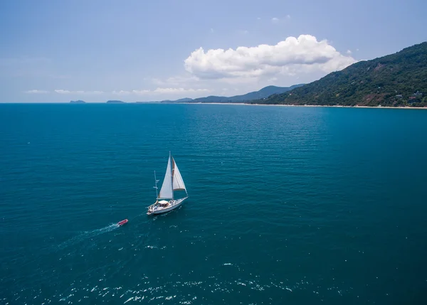 Aerial view of sailing boats walking on the sea in Koh Phangan