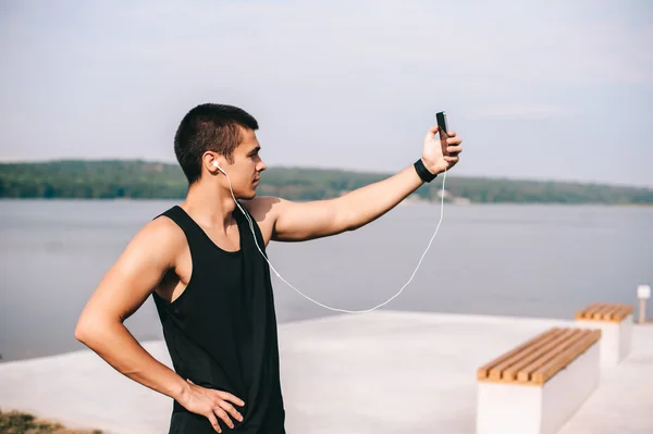 Young  guy taking selfie