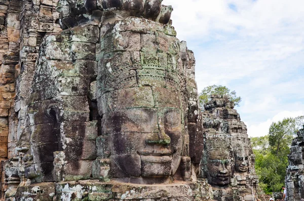 Buddha faces of Bayon Temple at Angkor Wat complex, Siem Reap, Cambodia. September 1, 2015