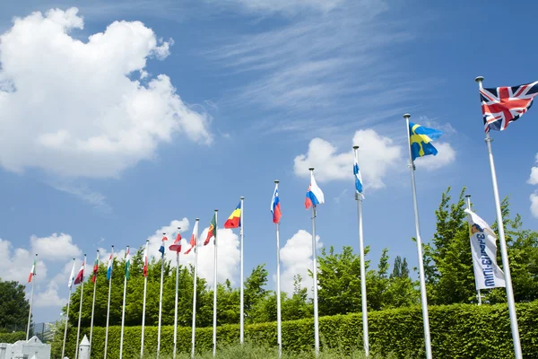 BRUSSELS, BELGIUM - 13 MAY 2016: Miniatures at the park Mini-Europe - reproductions of monuments in the European Union at a scale of 1:25. Flags of the European Union