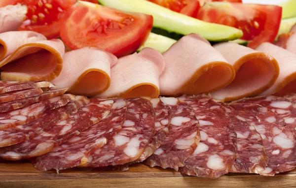 Sliced dry sausages and meat products, cured meat, bacon, with f