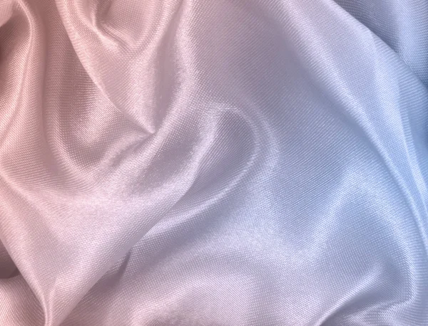 Rose quartz and serenity color silk background