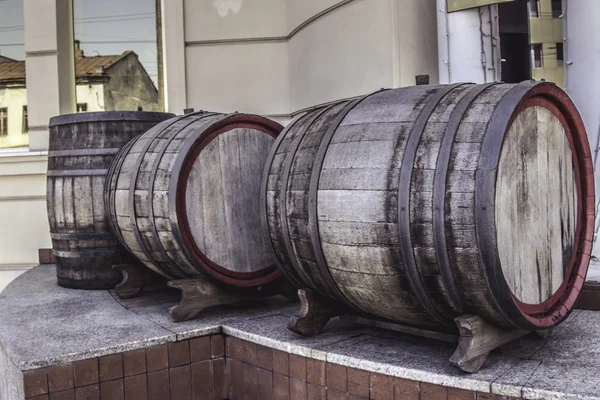 Old wood barrels with old brandy close up