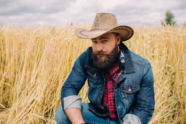 Bearded man in field