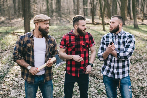 Bearded men in a forest