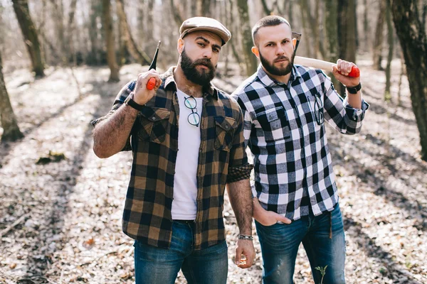 Bearded men in forest