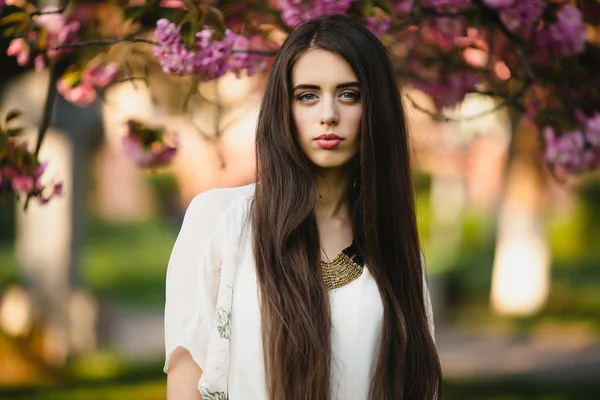 Young woman in oriental cherries