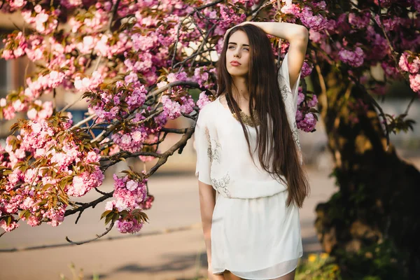 Young woman in oriental cherries