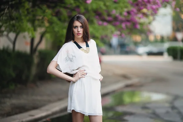 Young woman in oriental cherries