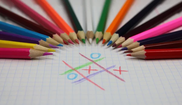Colored pencils and  crosses and zeroes