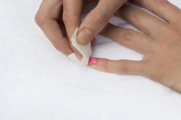 Nail polish remover on a white background