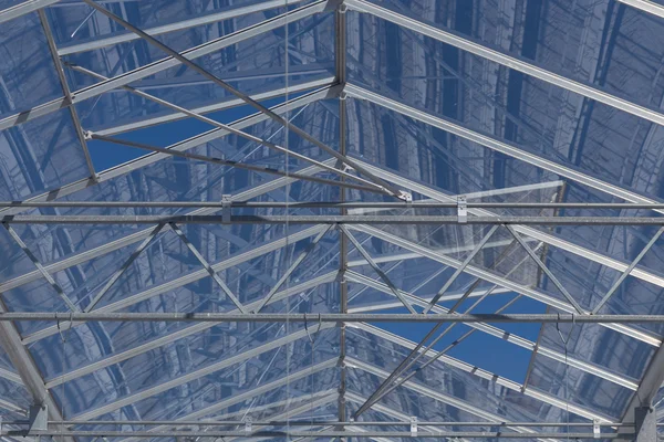 Glass roof of a big commercial greenhouse
