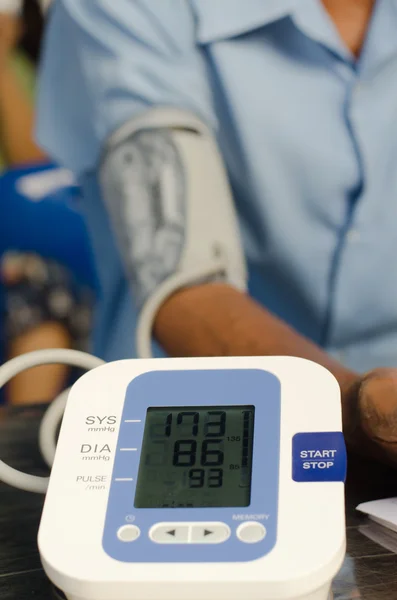 Close Up Of A Doctor Checking Blood Pressure Of A Patient