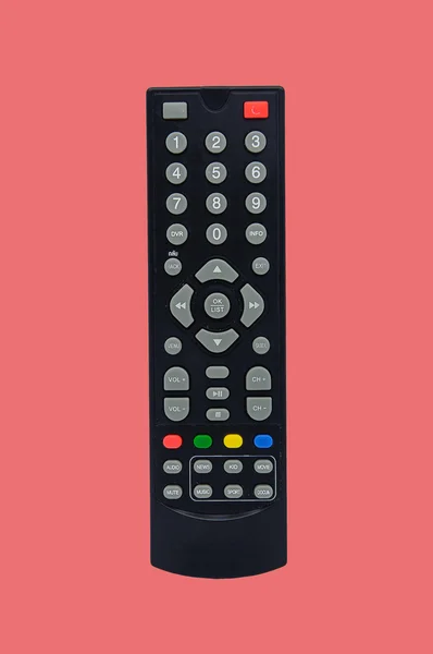 TV remote control isolated on a colorful background.