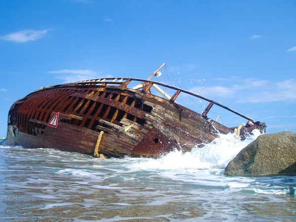 Shipwreck of a vessel after a storm.