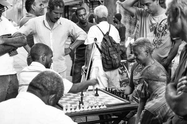 Santo Domingo, Dominican Republic - January 30, 2016:Santo Domingo, Dominican Republic - January 24, 2016: Men playing chess in Conde Street. Santo Domingo, Dominican Republic.