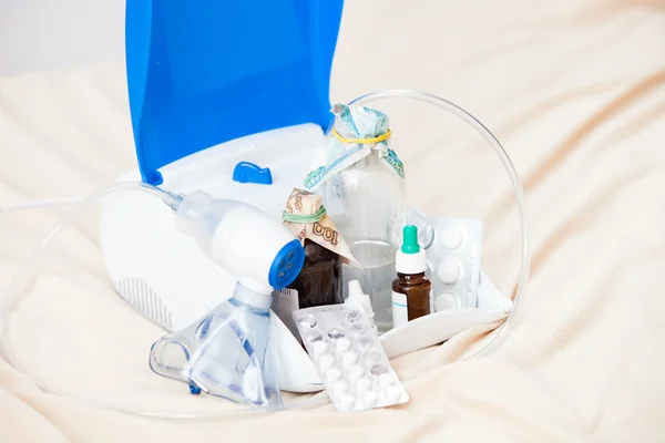 Nebulizer and medications for nebulizers wrapped money