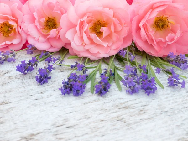 Pink curly open roses and provence lavender bouquet