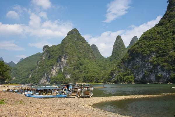 Yangshou Guilin, september-18th:Cruise ship packed with tourists travels the magnificent scenic route along the Li river Yangshou Guilin China