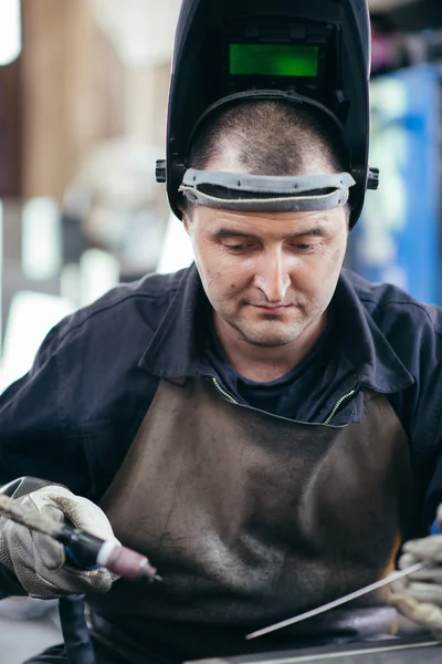 Welder using acetylene welding outfit