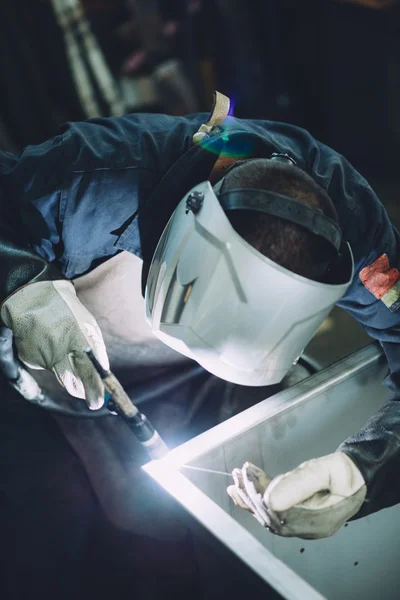 Welder using acetylene welding outfit