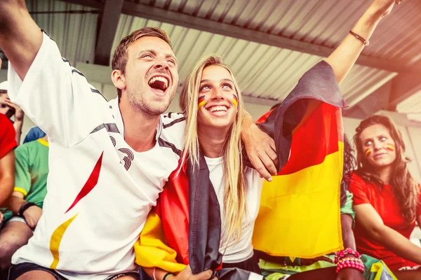 German Couple Supporting the Team