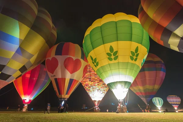 CHIANG RAI , THAILAND - FEBRUARY 14, 2016 : Hot air balloon show at night in Thailand International Balloon Festival 2016 in SINGHA Park of Thailand ,CHIANG RAI Thailand.