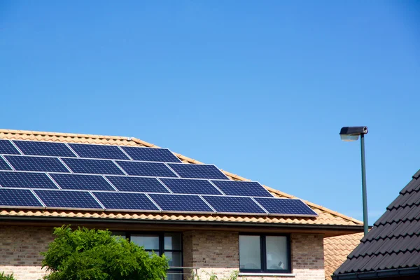 Photovoltaics on the roof of a residential building for alternative energy production