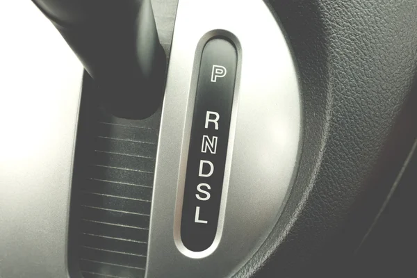 Gear shift handle in a modern car, automatic gear shift of a com