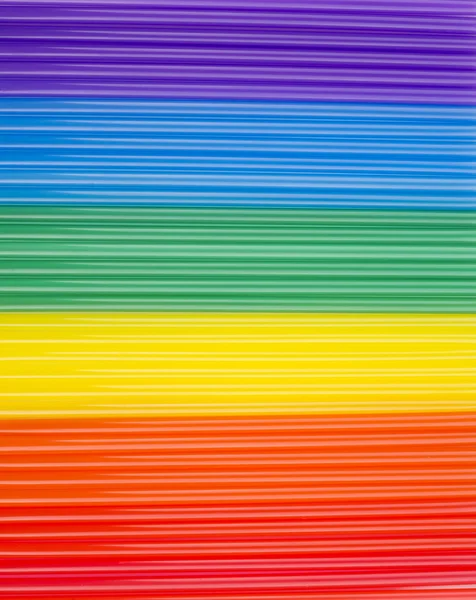 Texture of rainbow cocktail sticks. rainbow horizontalstripes.