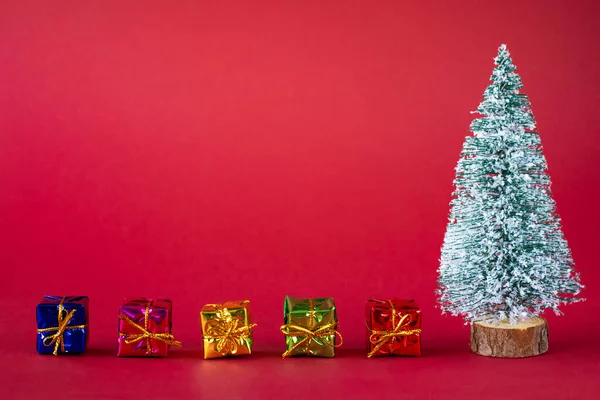 Christmas Holiday Background Snow Covered Christmas Tree Bright Multi Colored — Stock Photo, Image