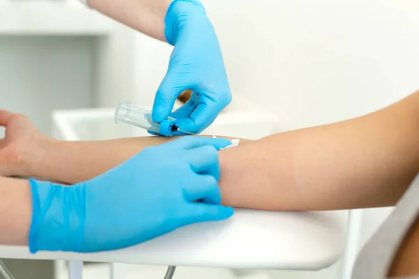 Gloved Nurse Inserts Needle Vein Patients Arm Draws Blood Vacuum — Stock Photo, Image