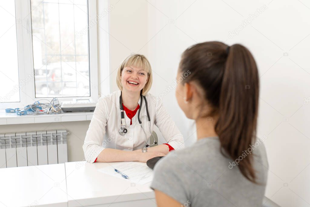 Physiotherapist Young girl at the reception of a physiotherapist at a medical clinic.