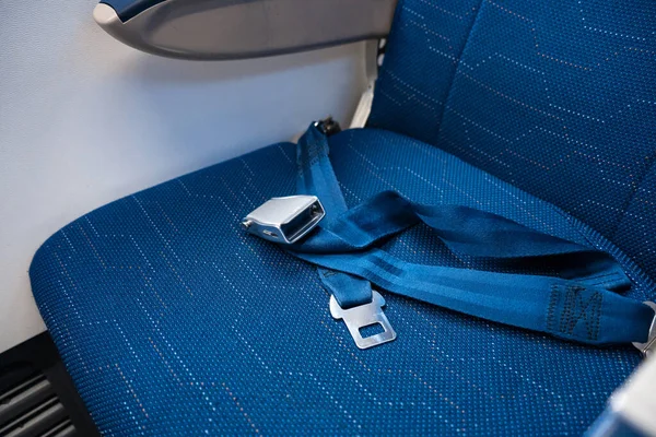 Unfastened Seat Belt Empty Seat Airplane Safety Flight — Stock Photo, Image