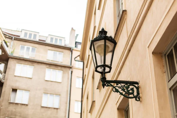 The architecture of the old city of Prague. Retro gothic street lamp for street lighting. Photo in the afternoon