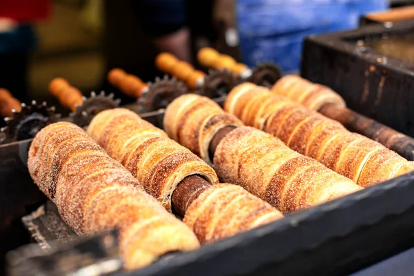 A popular national street food of the Czech Republic. Baking at the street stalls of the popular Trdlo