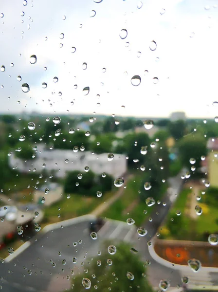 Raindrops on glass. Rainy weather. sad day.