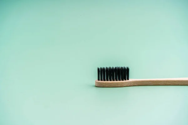 Eco Friendly Antibacterial Bamboo Wood Toothbrush Black Bristles Light Green — Stock Photo, Image