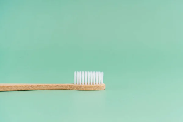 Environmentally Friendly Bamboo Wood Antibacterial Toothbrush Light Green Background — Stock Photo, Image
