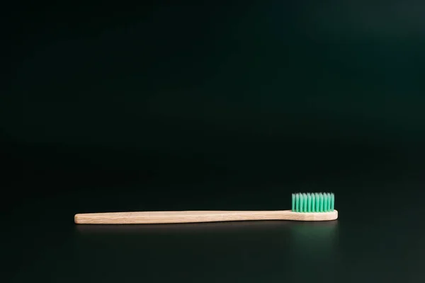 Eco Friendly Antibacterial Bamboo Wood Toothbrush Dark Green Background Taking — Stock Photo, Image