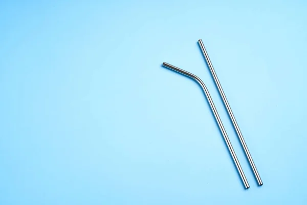 The modern trend towards caring for the environment. Two reusable metal beverage straws.